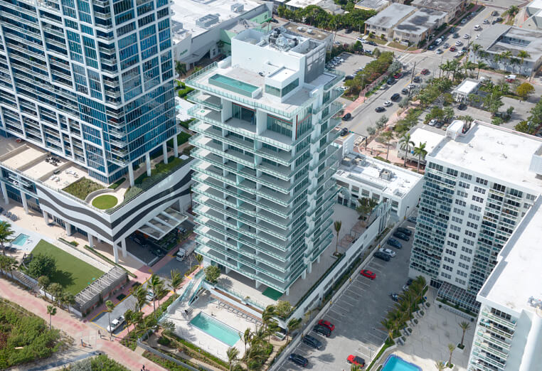 A building with many floors and some buildings