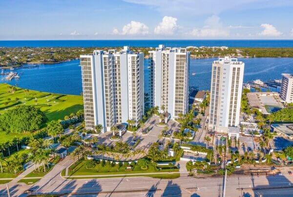 A view of the ocean and buildings from above.